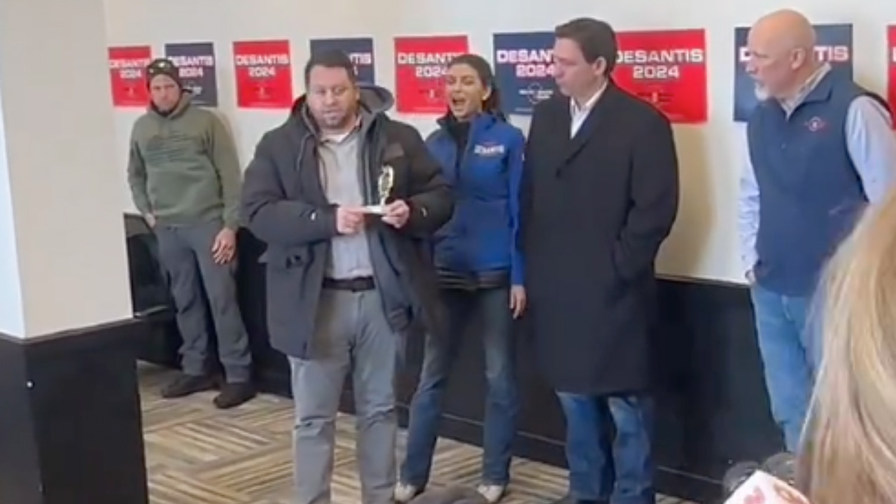 Ron DeSantis Taunted with 'Participation Trophy' at Campaign Event: A Pre-Iowa Caucuses Twist!